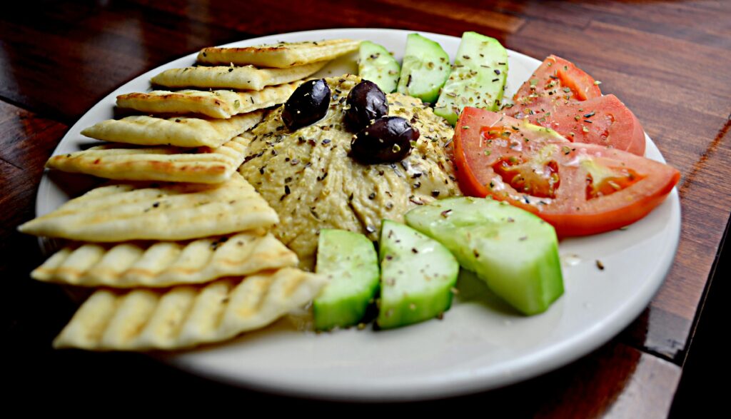 Sliced Tomato With Cucumber and Taco